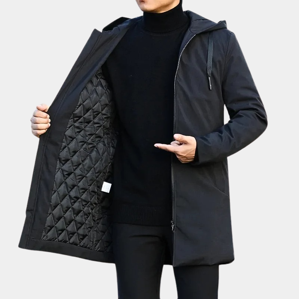 Veste longue "Enzo" pour homme, noire, avec capuche et doublure matelassée chauffante, offrant un style moderne et une protection optimale contre le froid.