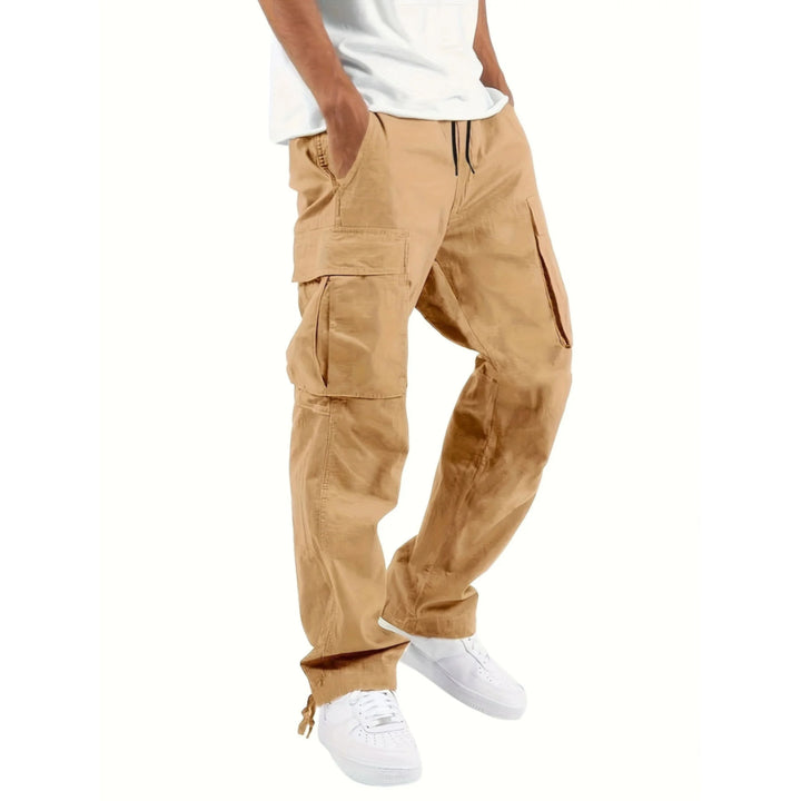 Pantalon cargo pour homme, coupe droite large et multi-poches adapté aux tenues utilitaires.