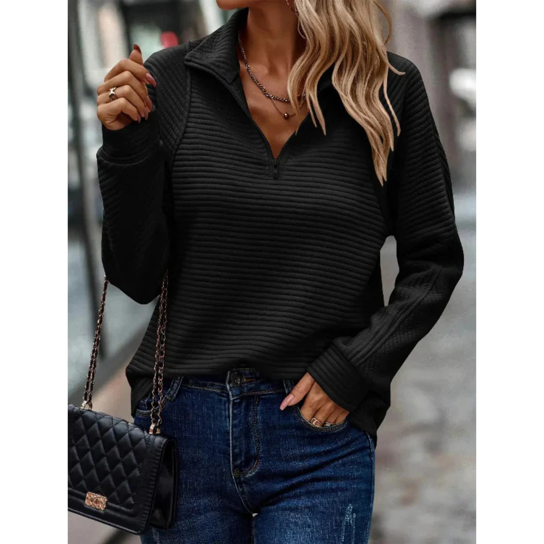 Pull Orietta pour femme, col zippé et manches longues adaptés aux journées fraîches.