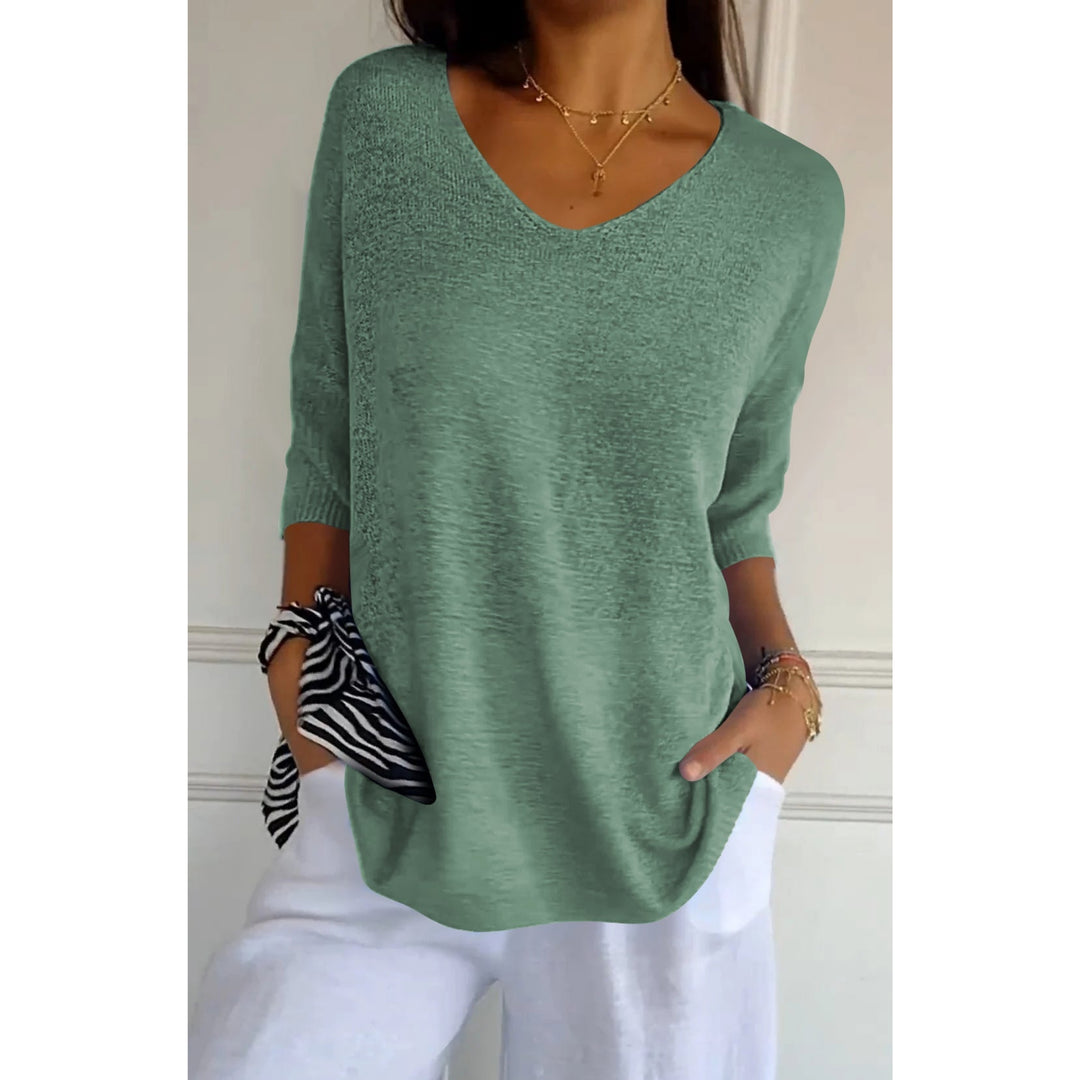 Pull Auxane col V ample pour femme, coupe cocooning adaptée aux tenues détente automnales.