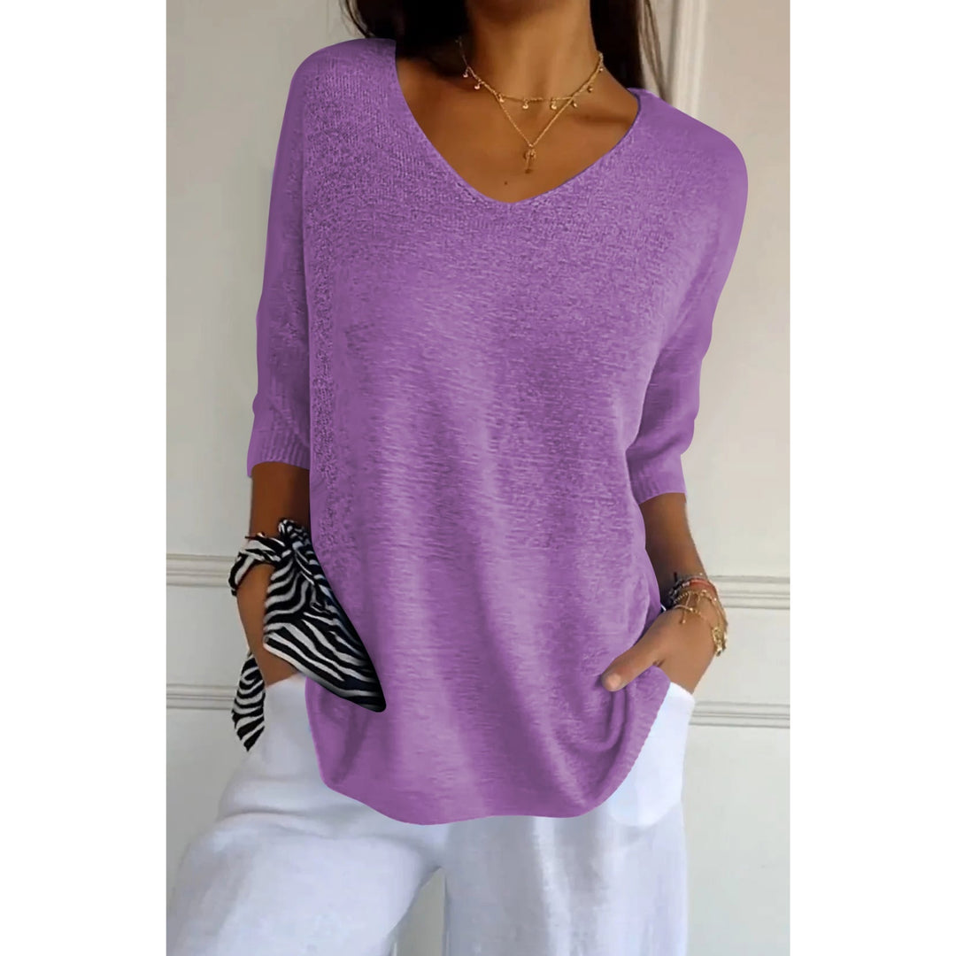 Pull Auxane col V ample pour femme, coupe cocooning adaptée aux tenues détente automnales.