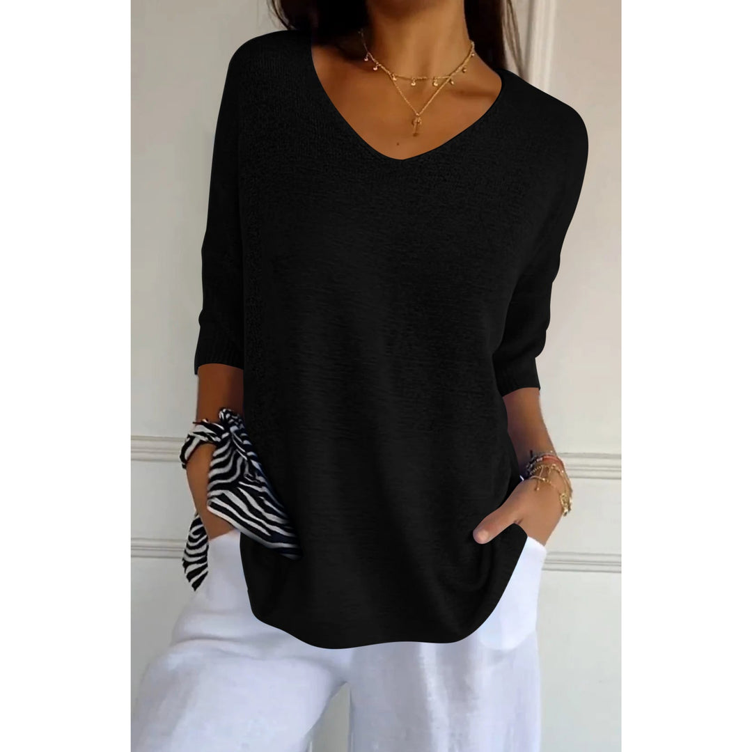 Pull Auxane col V ample pour femme, coupe cocooning adaptée aux tenues détente automnales.
