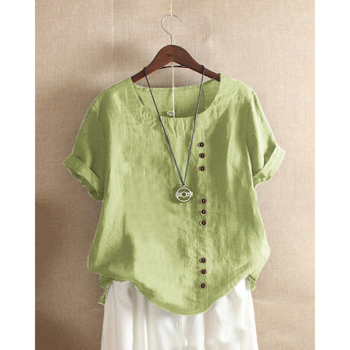 Blouse pour femme à manches courtes et col rond, teinte unie, coupe ample et tissu léger adapté aux journées chaudes.