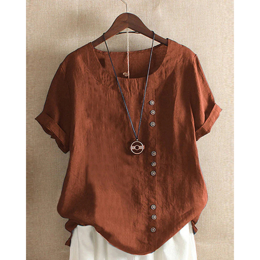 Blouse pour femme à manches courtes et col rond, teinte unie, coupe ample et tissu léger adapté aux journées chaudes.