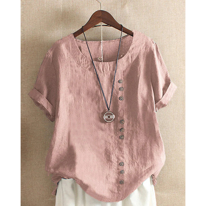 Blouse pour femme à manches courtes et col rond, teinte unie, coupe ample et tissu léger adapté aux journées chaudes.