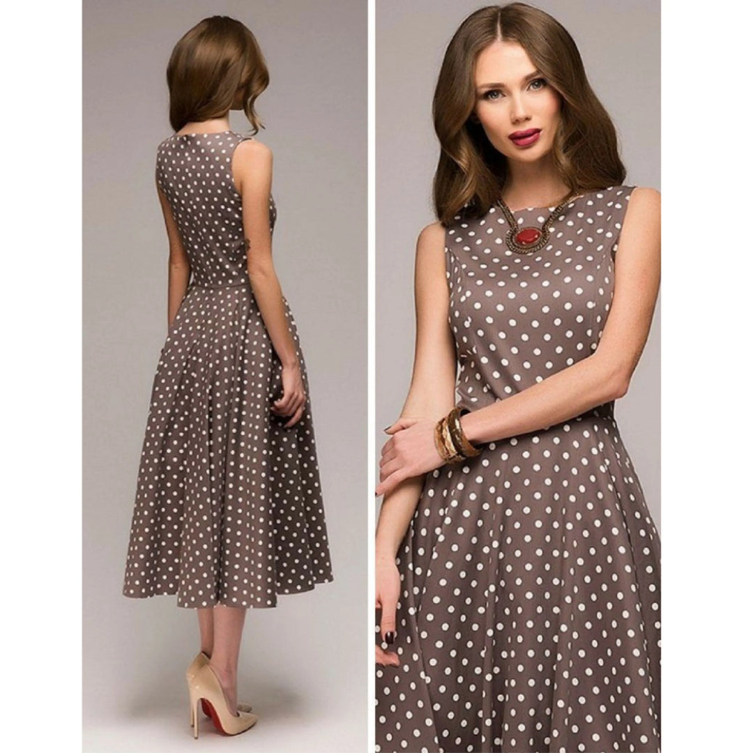 Robe à pois pour femme, coupe raffinée et motif rétro adapté aux tenues polyvalentes.