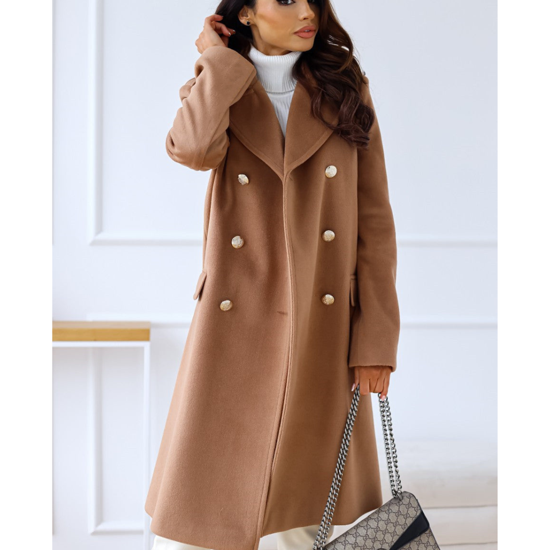 Manteau Elicia élégant pour femme, coupe raffinée et matière chaude adaptée aux journées hivernales.