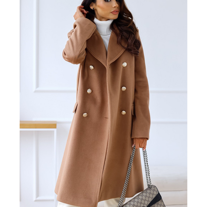 Manteau Elicia élégant pour femme, coupe raffinée et matière chaude adaptée aux journées hivernales.