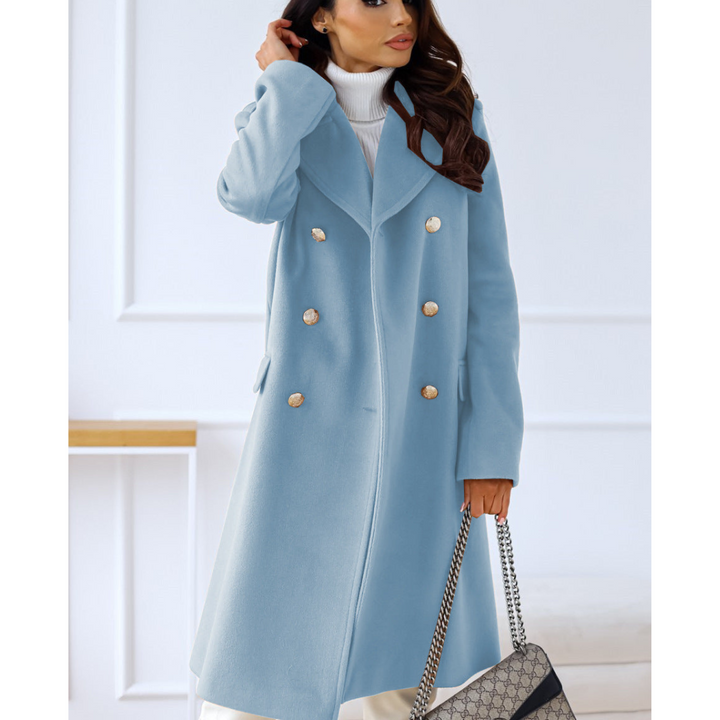 Manteau Elicia élégant pour femme, coupe raffinée et matière chaude adaptée aux journées hivernales.