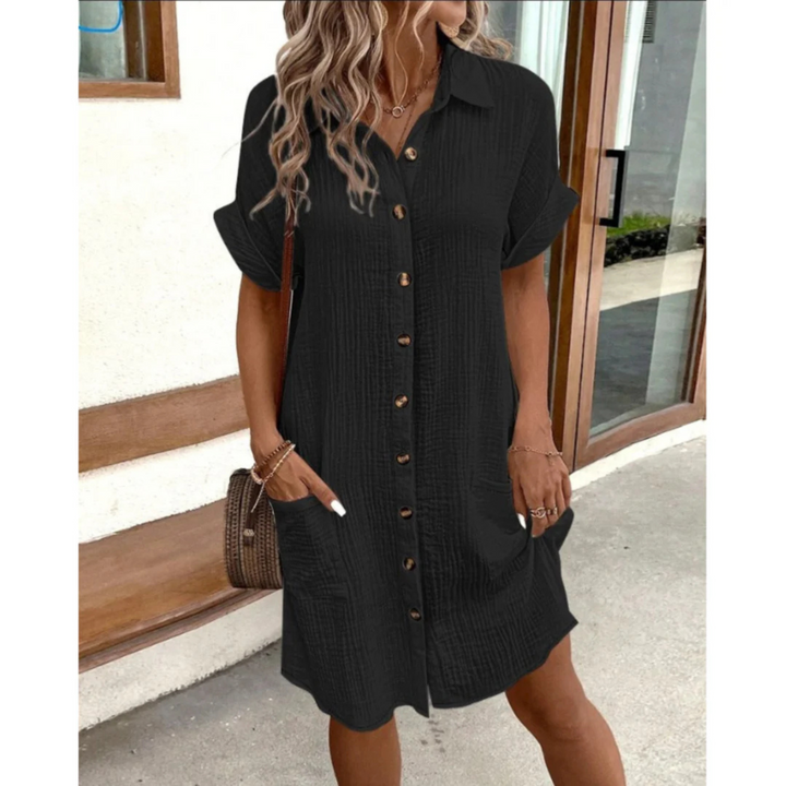 Robe chemise pour femme à style chic, coupe polyvalente et finition soignée, adaptée aux occasions habillées comme décontractées.