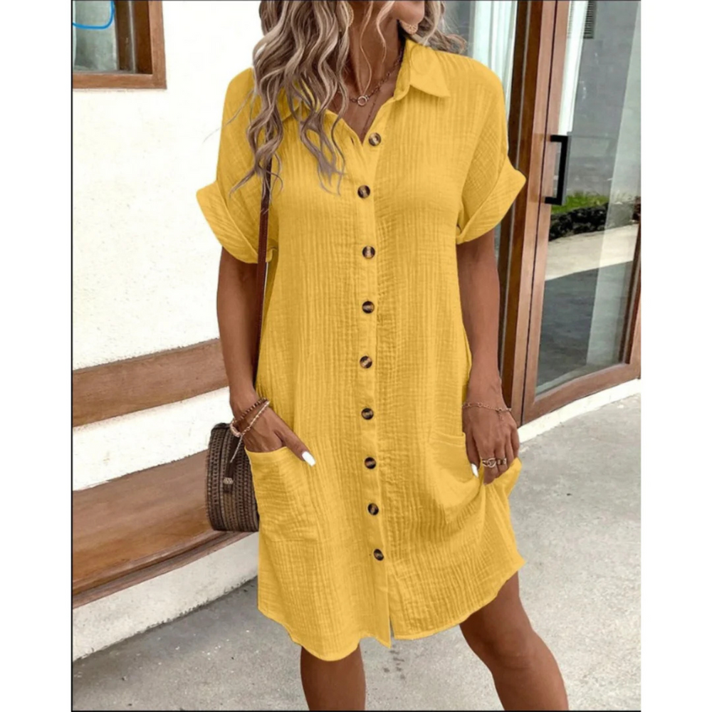 Robe chemise pour femme à style chic, coupe polyvalente et finition soignée, adaptée aux occasions habillées comme décontractées.