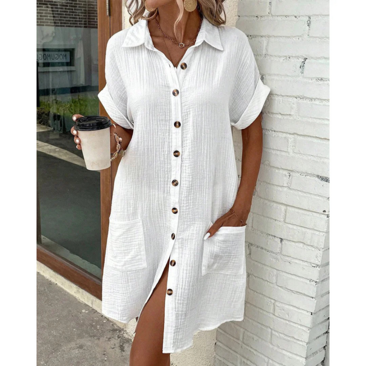 Robe chemise pour femme à style chic, coupe polyvalente et finition soignée, adaptée aux occasions habillées comme décontractées.