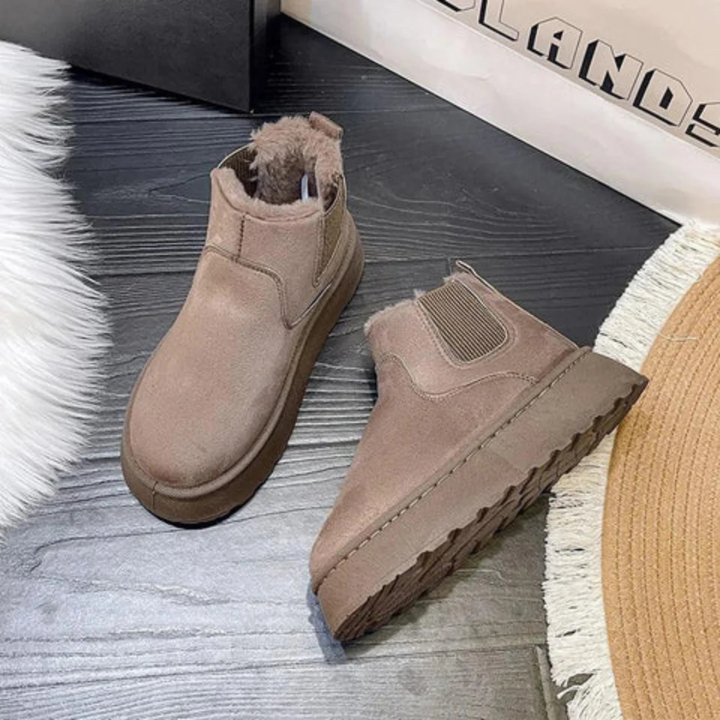 Bottines Malorie d'hiver protectrices pour femme, adaptées aux tenues hivernales polyvalentes.