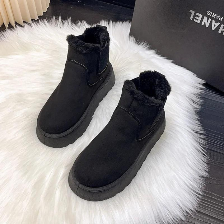 Bottines Malorie d'hiver protectrices pour femme, adaptées aux tenues hivernales polyvalentes.