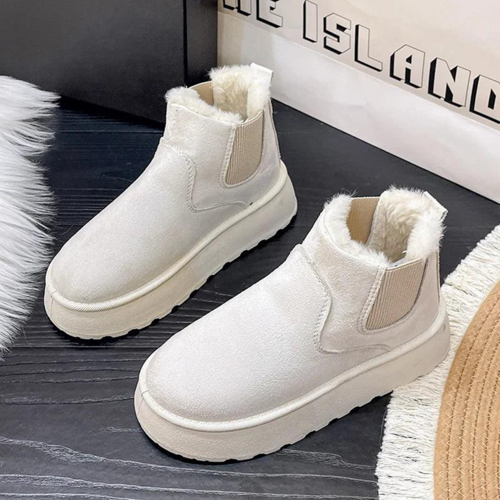 Bottines Malorie d'hiver protectrices pour femme, adaptées aux tenues hivernales polyvalentes.