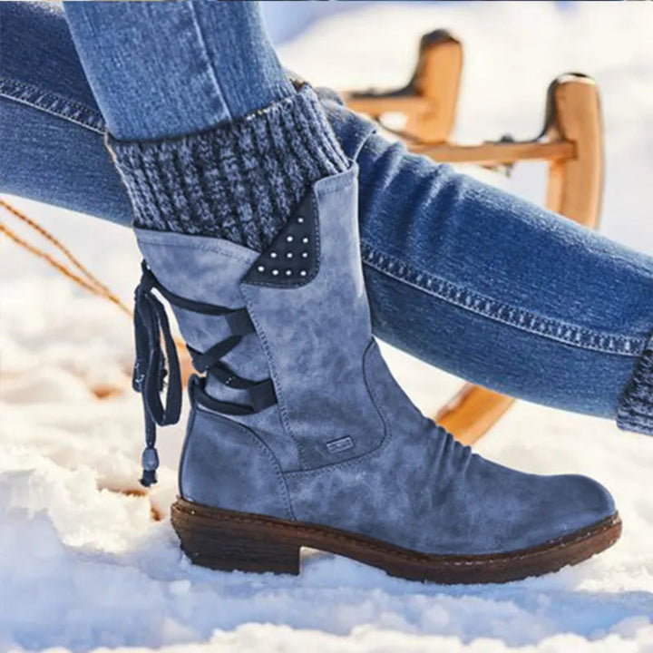 Bottines Faymé d'hiver chaudes pour femme, semelle antidérapante adaptée aux tenues hivernales.