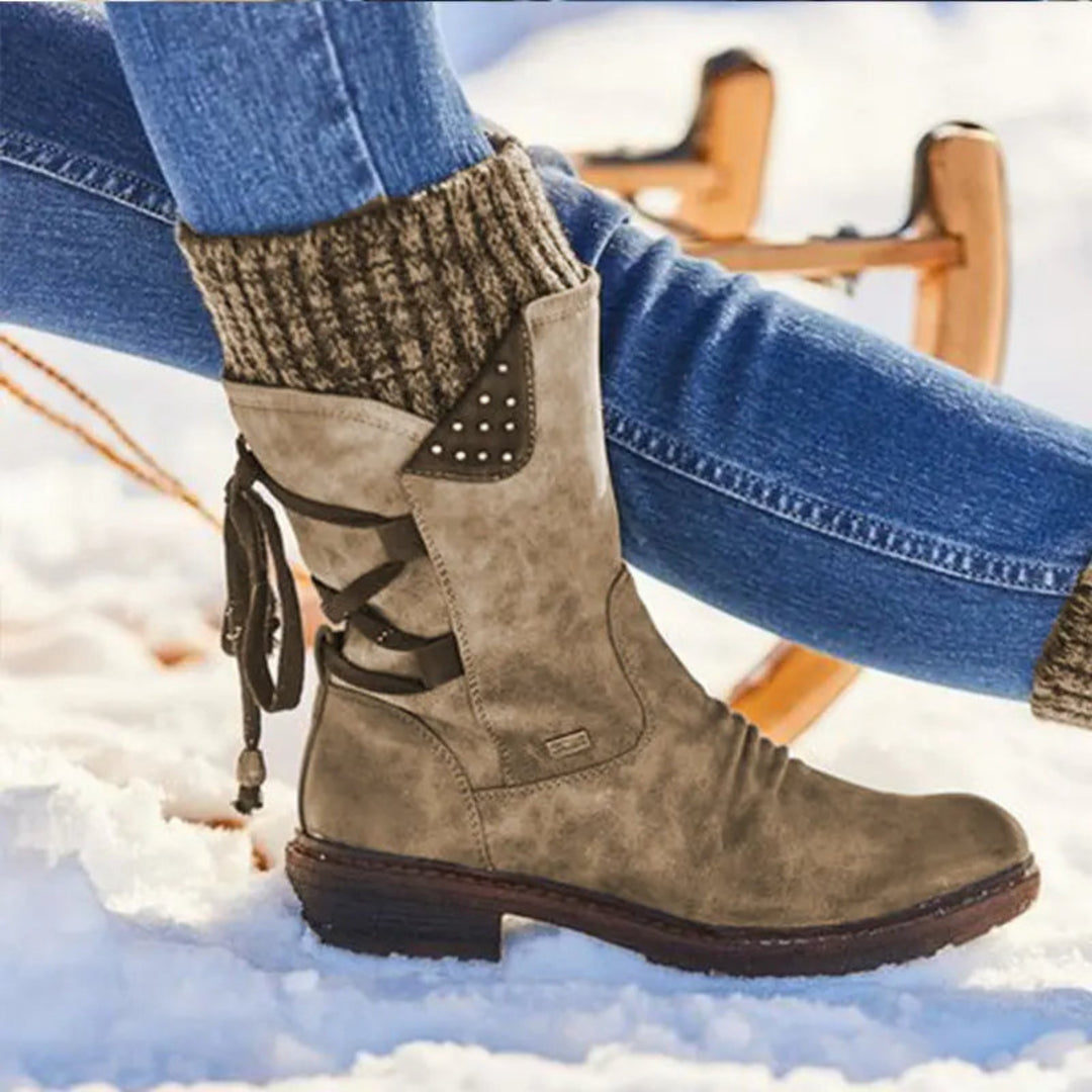 Bottines Faymé d'hiver chaudes pour femme, semelle antidérapante adaptée aux tenues hivernales.