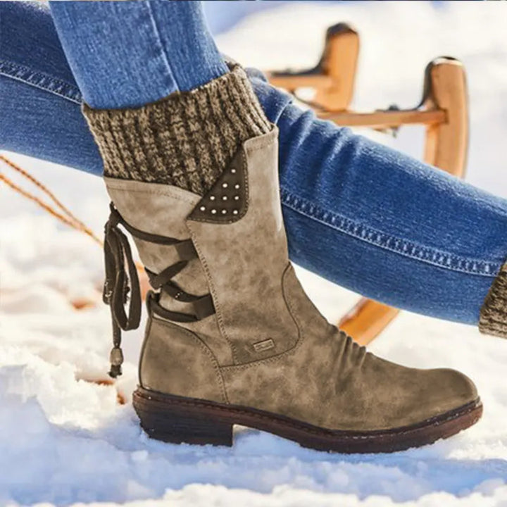 Bottines Faymé d'hiver chaudes pour femme, semelle antidérapante adaptée aux tenues hivernales.