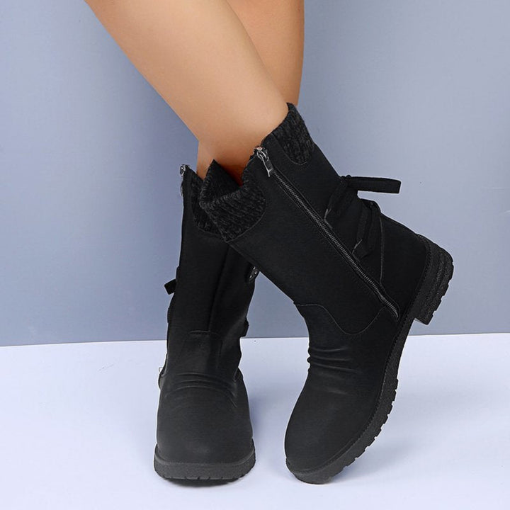 Bottines Faymé d'hiver chaudes pour femme, semelle antidérapante adaptée aux tenues hivernales.