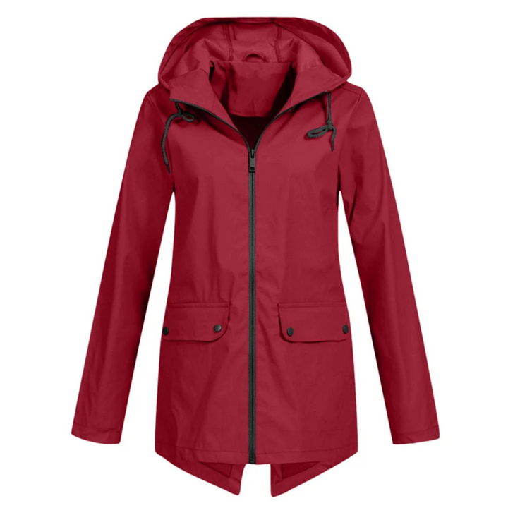 Veste de pluie Zénaïde pour femme, imperméable et coupe-vent adaptée aux journées automnales pluvieuses.