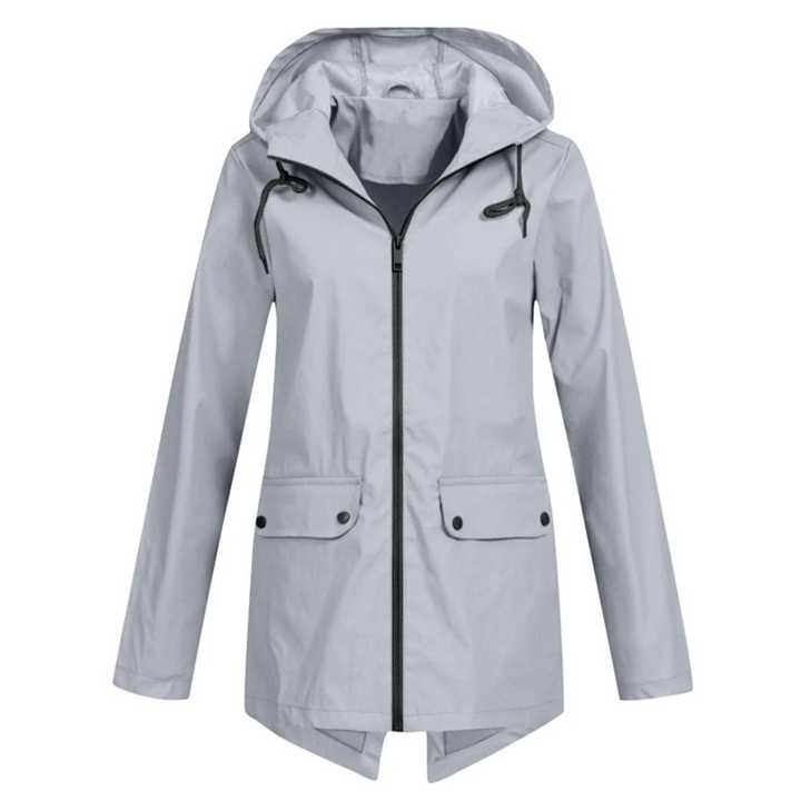 Veste de pluie Zénaïde pour femme, imperméable et coupe-vent adaptée aux journées automnales pluvieuses.