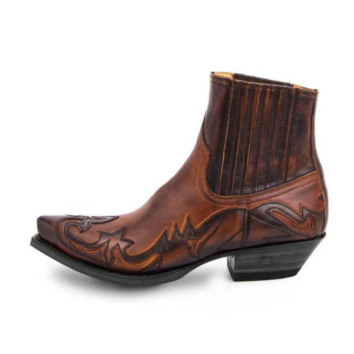 Les bottes Western pour homme Aymeric, au style moderne, offrent une finition en cuir de qualité avec des motifs élégants. Parfaites pour un look tendance, elles combinent confort et robustesse, tout en ajoutant une touche de caractère à vos tenues casual ou western.