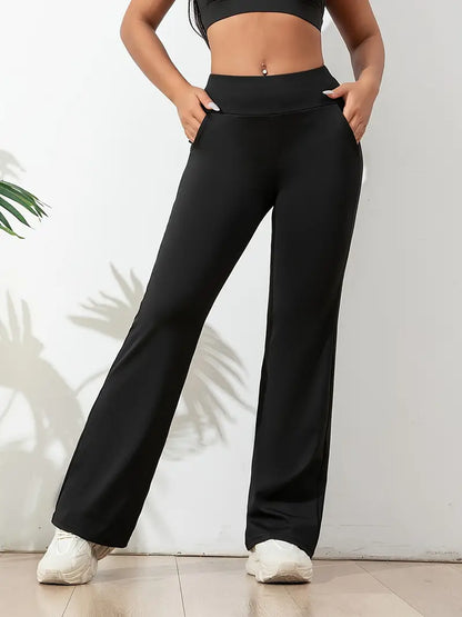  Legging noir taille haute pour femme, coupe évasée avec poches pratiques. Idéal pour le fitness, le yoga ou les sorties décontractées, offrant maintien, confort et élégance.