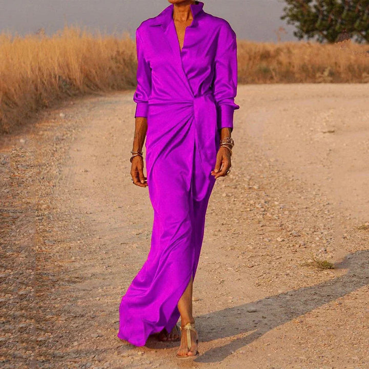 Adoptez l'élégance et la couleur avec la robe longue portefeuille Deloria pour femme, en violet éclatant. Son design moderne, avec une coupe fluide et un col sophistiqué, met en valeur la silhouette féminine. Parfaite pour toutes les occasions, cette robe en tissu léger et agréable est idéale pour un look chic et raffiné, que ce soit pour une soirée spéciale ou une sortie estivale.
