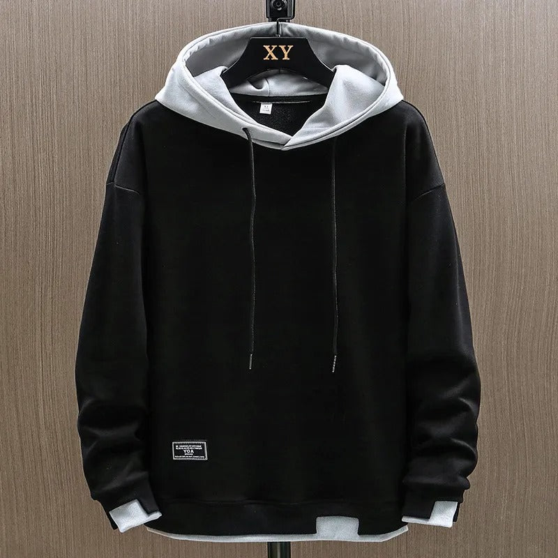 Sweat à capuche Émilien pour homme, matière douce adaptée aux tenues cocooning mi-saison.