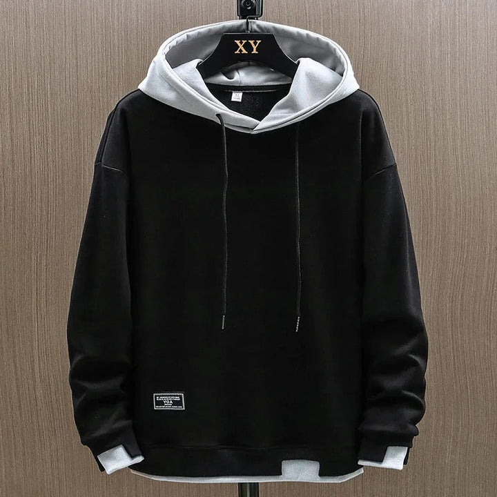 Sweat à capuche Émilien pour homme, matière douce adaptée aux tenues cocooning mi-saison.