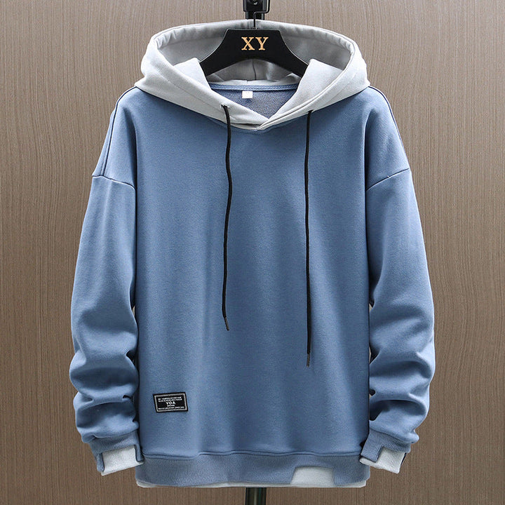 Sweat à capuche Émilien pour homme, matière douce adaptée aux tenues cocooning mi-saison.
