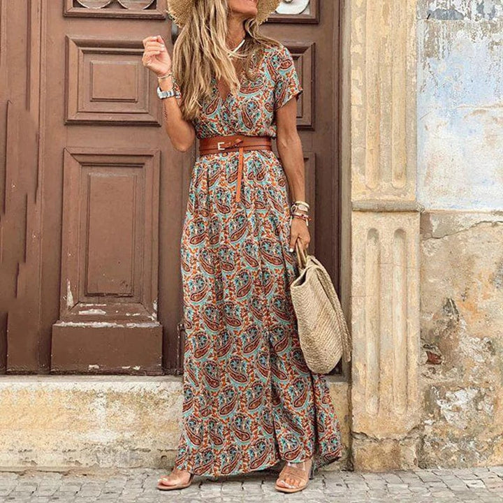 Robe Flavie longue à motif pour femme, coupe fluide et tissu léger adapté aux tenues estivales.