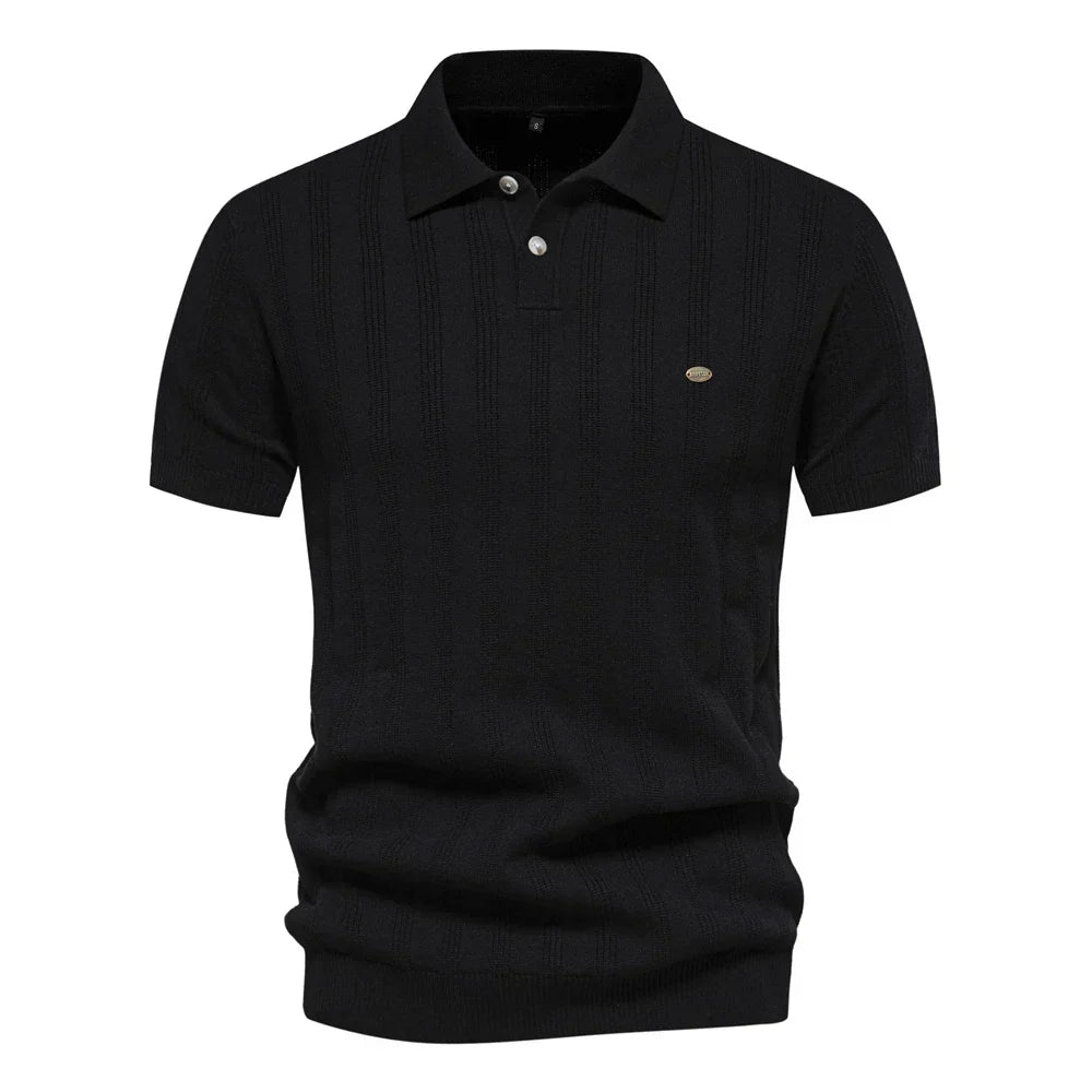 Polo en maille pour homme Florentin, style moderne avec fines rayures verticales, coupe élégante, col classique et manches courtes, en coloris noir pour un look chic et intemporel.
