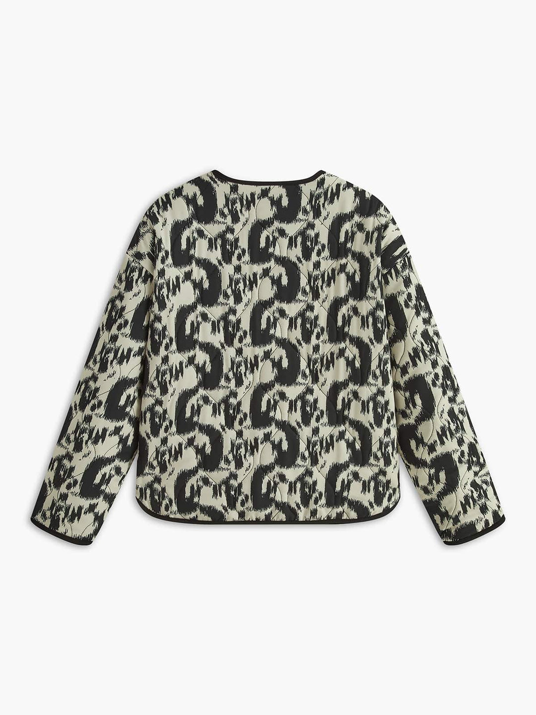 Vue arrière du manteau ajusté à sequins 'Girelle' pour invitées de mariage. Ce manteau moderne présente un motif animalier en noir et blanc avec une finition élégante et soignée. Idéal pour une occasion spéciale, il combine confort et style tout en apportant une touche sophistiquée à votre tenue.