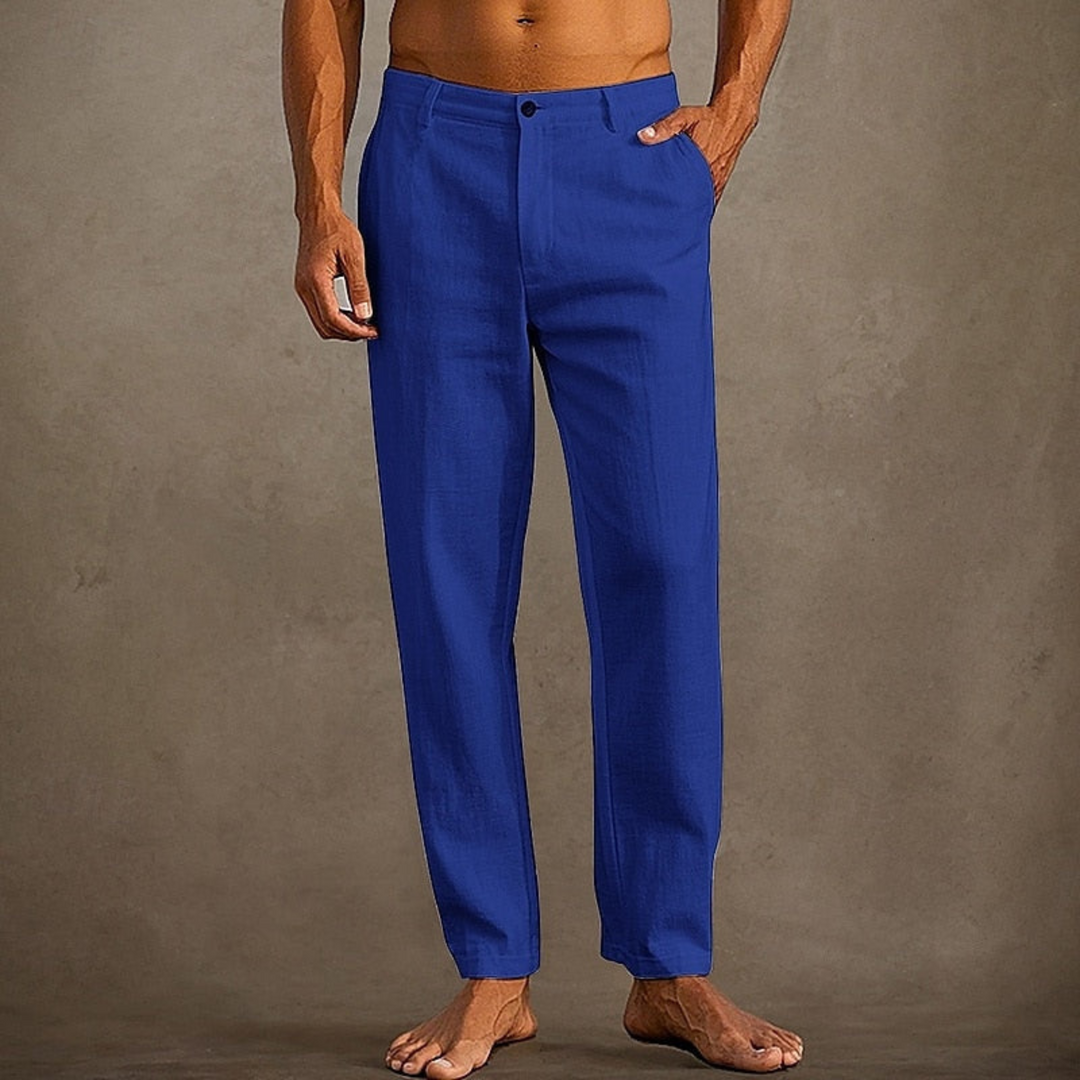 Pantalon d'été pour homme décontracté à coupe classique, tissu léger et fluide, adapté aux journées chaudes.