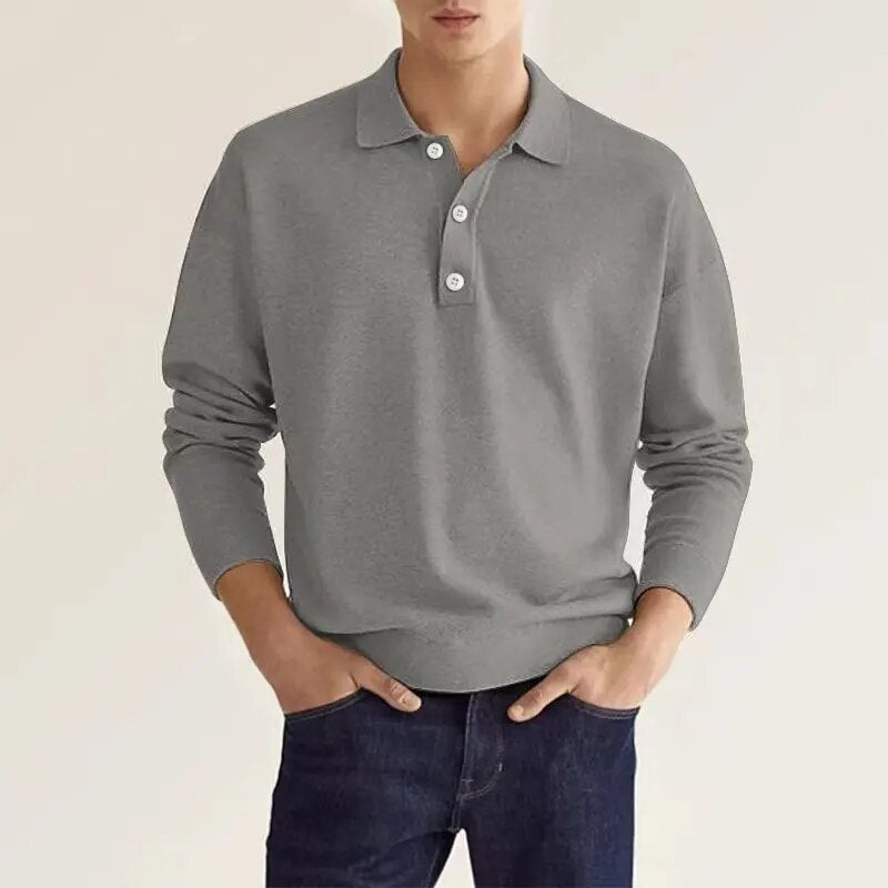 Le polo homme manches longues en couleur gris moyen combine confort et modernité. Avec son col classique et ses boutons discrets, il crée un look élégant et intemporel. Ce polo est idéal pour un style décontracté mais soigné, parfait pour toutes les occasions.
