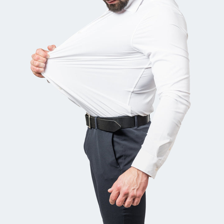Chemise stretch à manches longues pour homme, modèle Julien, de couleur blanche, coupe ajustée, tissu extensible démontré pour un confort optimal et une liberté de mouvement, idéale pour un style élégant et moderne.
