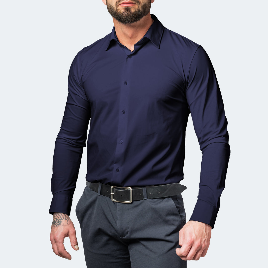Chemise stretch à manches longues pour homme, modèle Julien, de couleur bleu marine, coupe ajustée, tissu extensible offrant confort et liberté de mouvement, idéale pour un style élégant et tendance.