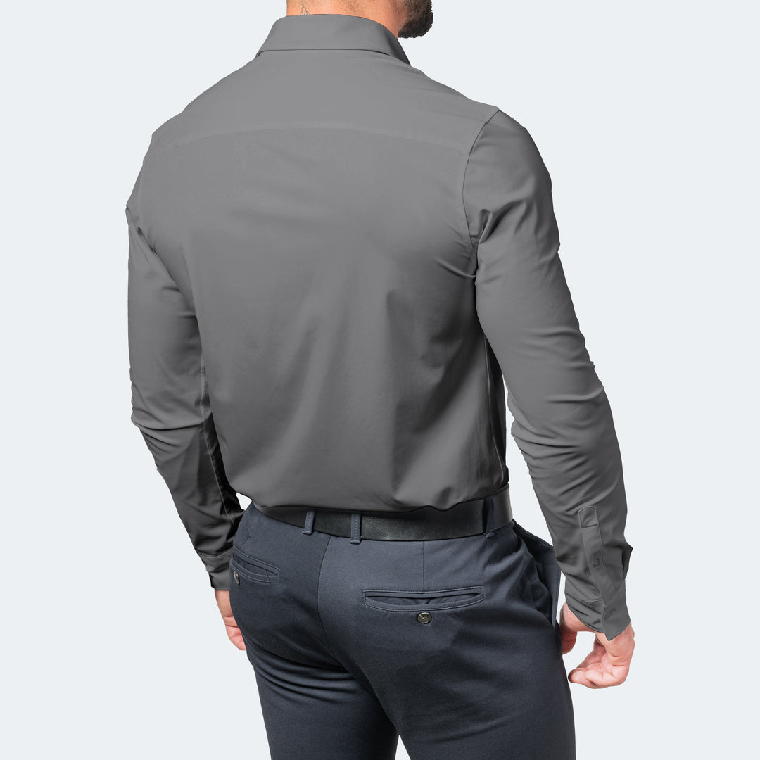 Chemise stretch à manches longues pour homme, modèle Julien, de couleur gris foncé, vue de dos, coupe ajustée, tissu extensible offrant confort et liberté de mouvement, idéale pour un style moderne et élégant.
