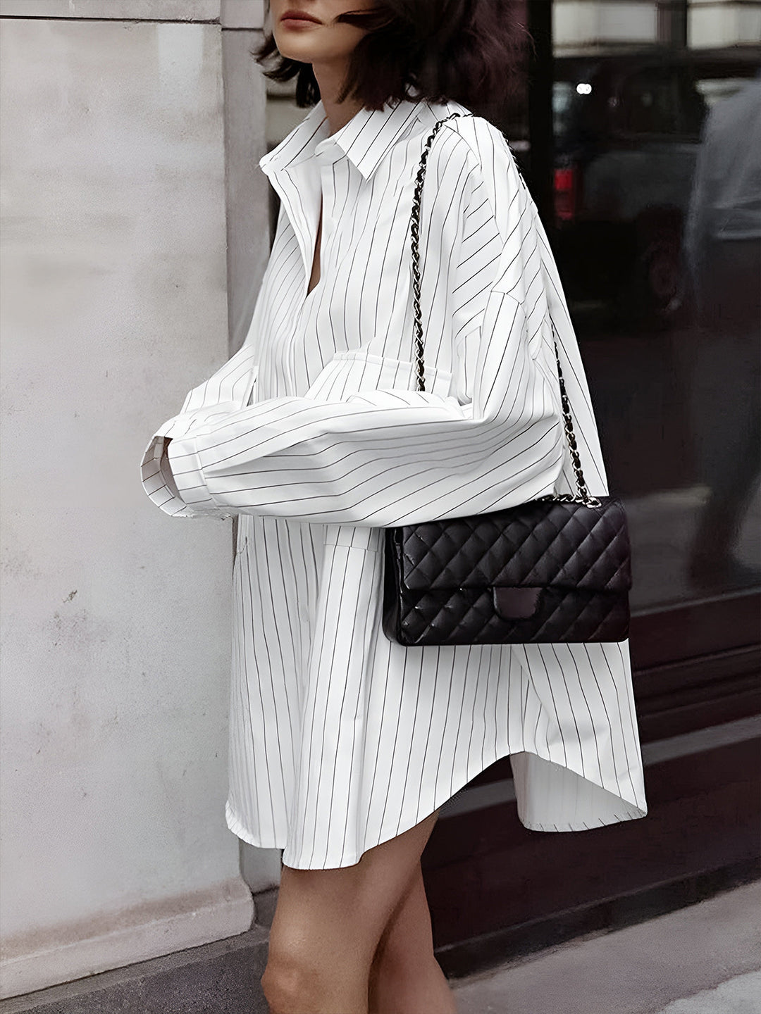 Chemise rayée oversize Latifa pour femme, boutons signature et coupe tendance adaptée aux tenues rentrée automnales.