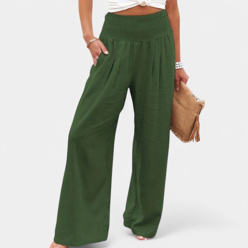 Ce pantalon en lin vert offre un style naturel et élégant. Avec sa taille élastique et sa coupe fluide, il est idéal pour un look décontracté et confortable. Parfait pour les journées chaudes, il se combine facilement avec une tenue simple et chic.
