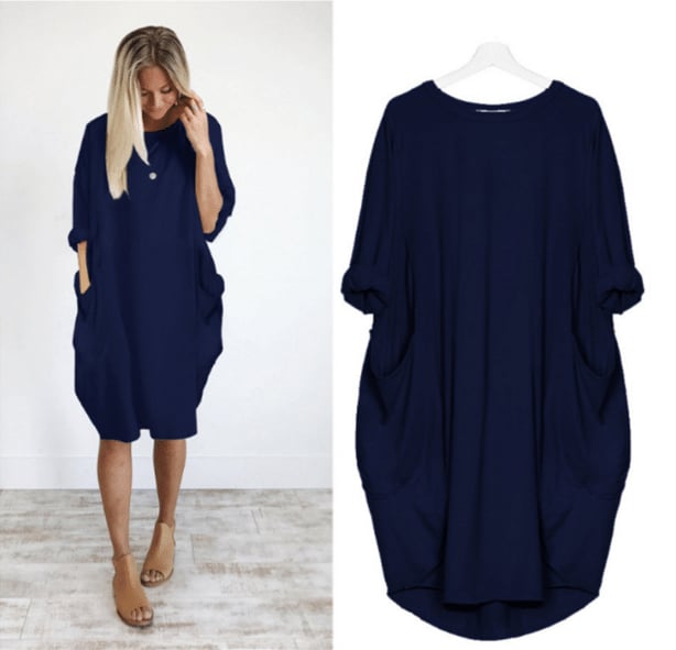 robe ample bleu marine à manches 3/4, col rond, poches latérales, coupe fluide et confortable, présentée portée et sur cintre.