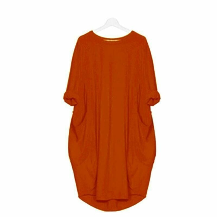 robe ample orange brique à col rond, manches 3/4, grandes poches latérales et ourlet arrondi, coupe fluide et confortable.