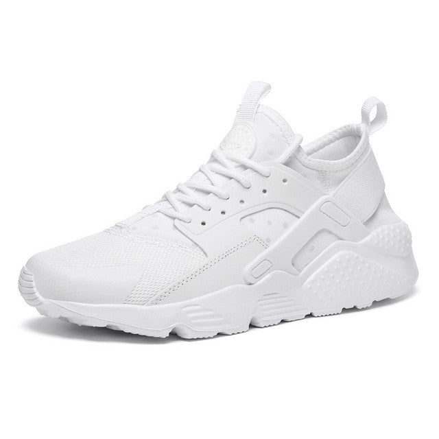 Sneaker homme blanche, légère et respirante, en mesh avec lacets et semelle épaisse amortissante, style urbain.