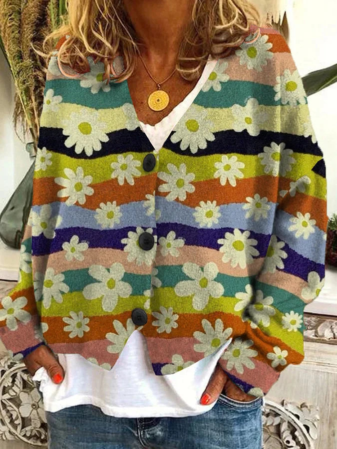 Ajoutez une touche de couleur à votre garde-robe avec le cardigan long Nadia. Son design multicolore avec des motifs floraux et sa coupe chaude en font l'élément parfait pour un confort stylé lors des journées fraîches. Idéal pour un look décontracté mais élégant.