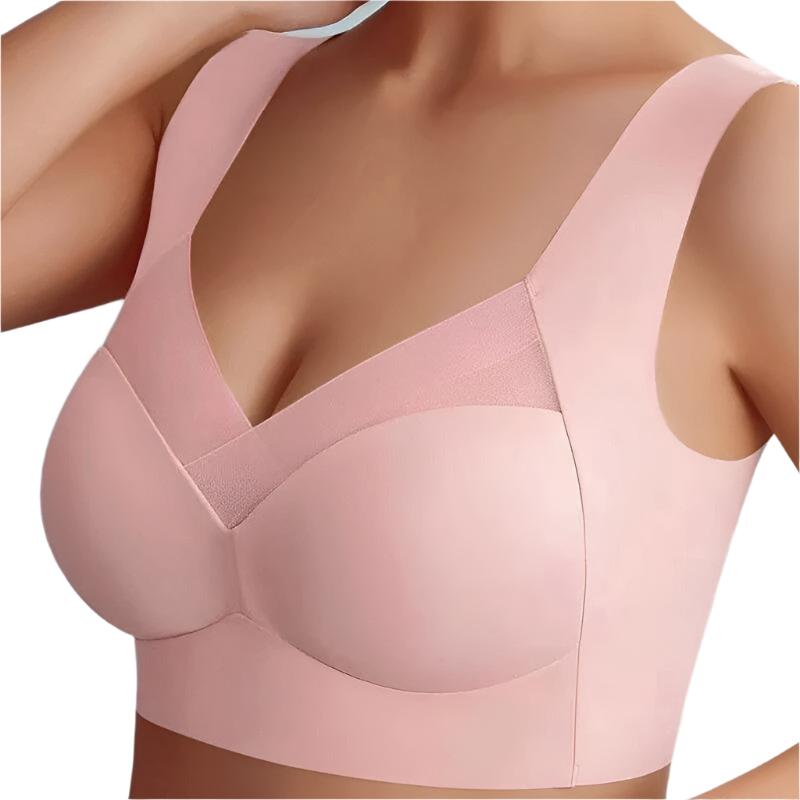 Soutien-gorge seamless rose clair avec des bonnets lisses et des bretelles larges pour un confort optimal. Le design sans coutures et la maille délicate sur le devant assurent un maintien parfait et une sensation agréable.