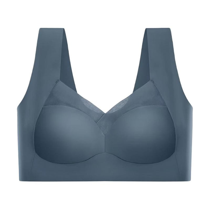 Soutien-gorge seamless bleu avec des bonnets lisses et des bretelles larges pour un soutien optimal. Le design sans coutures et la maille subtile sur le devant assurent un confort maximal et une silhouette élégante.