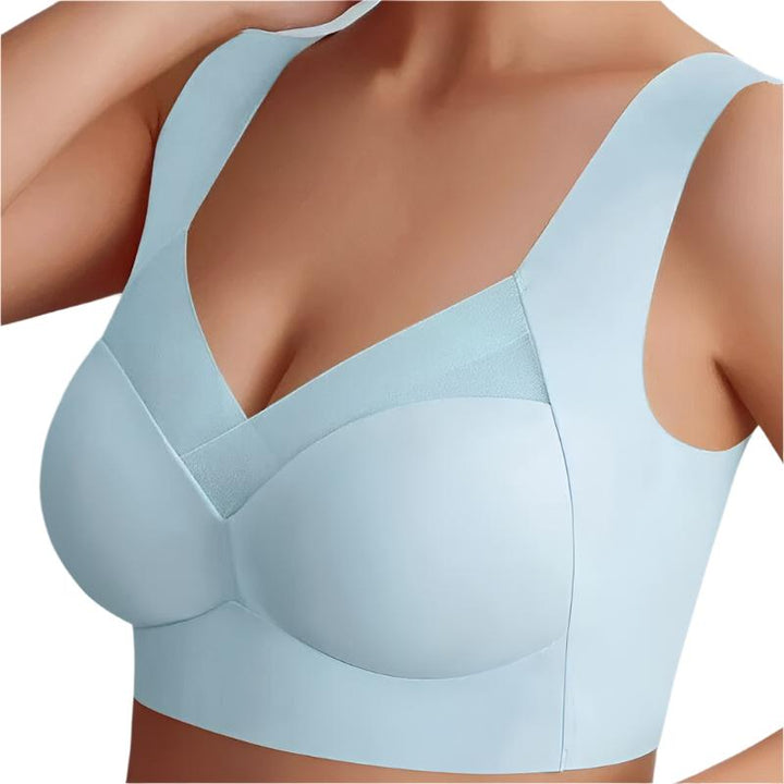 Soutien-gorge seamless bleu clair avec des bonnets lisses et des bretelles larges pour un maintien parfait. La conception sans coutures et la maille subtile sur le devant assurent un confort exceptionnel et un ajustement optimal.