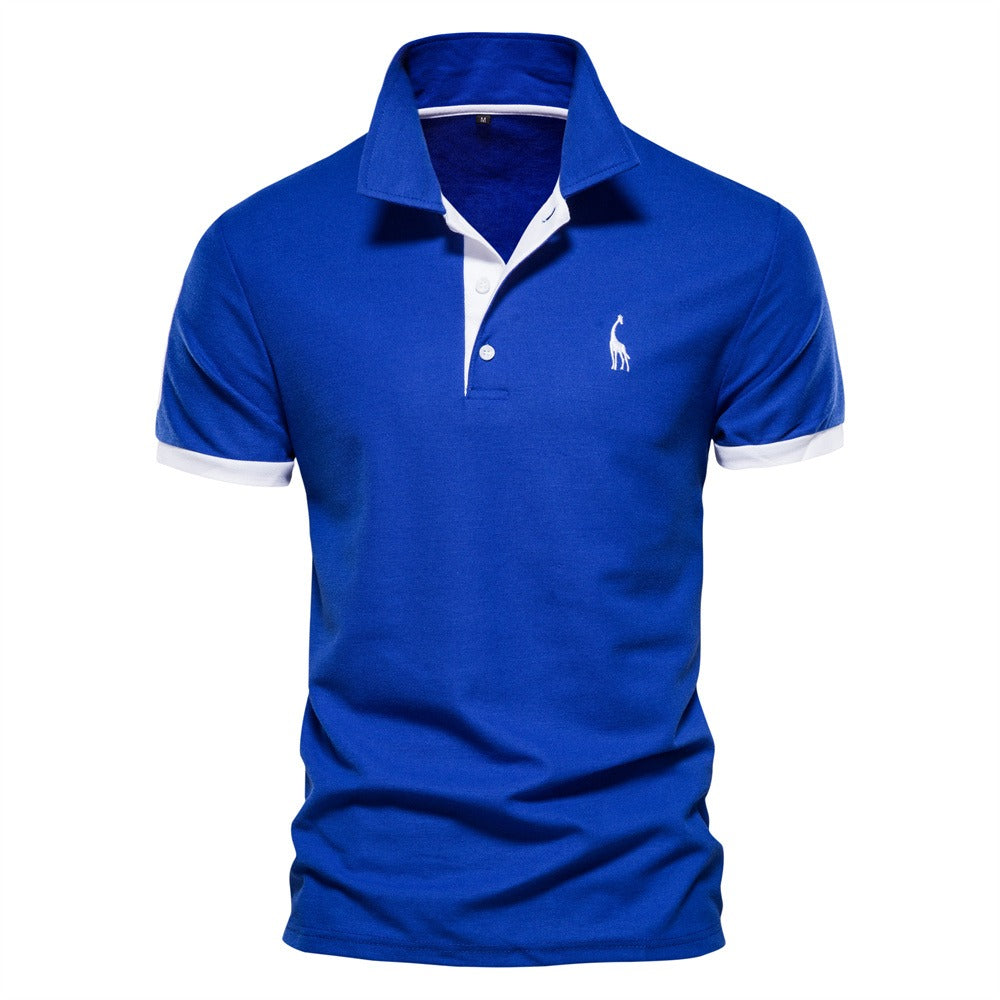 Polo homme Philippe tendance en bleu vif, avec col à boutons et finitions contrastées blanches sur les manches et l’intérieur du col, pour un look moderne et élégant.