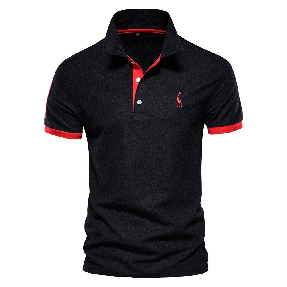 Polo homme Philippe tendance en noir, avec col à boutons et détails contrastés rouges sur les manches et l’intérieur du col, pour un look moderne et élégant.
